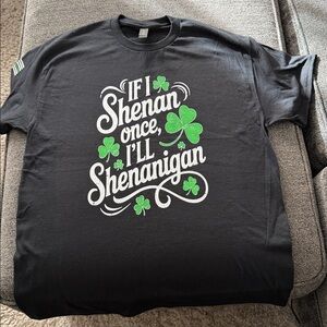 St. Patrick’s day Gildan Black Tee with Green Clover Graphic.